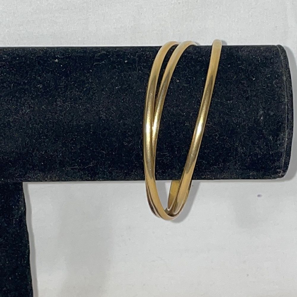 Three bangle bracelets  